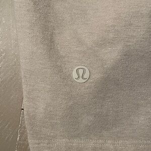 Lululemon twist front cropped short sleeve shirt in gold/cream